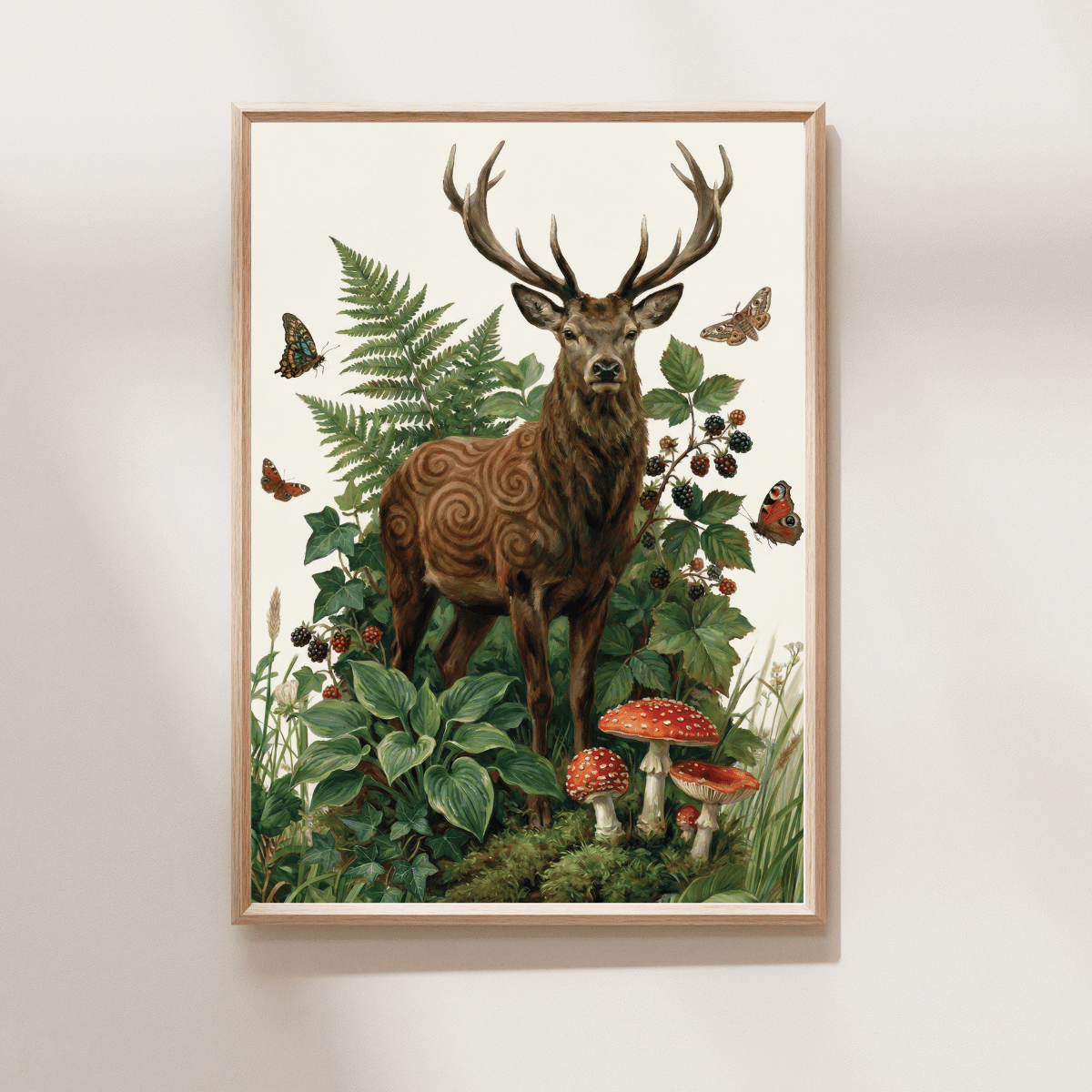 A framed vertical art print featuring a detailed woodland illustration of a stag with antlers standing among ferns, berries, mushrooms, and butterflies, displayed on a light neutral wall.