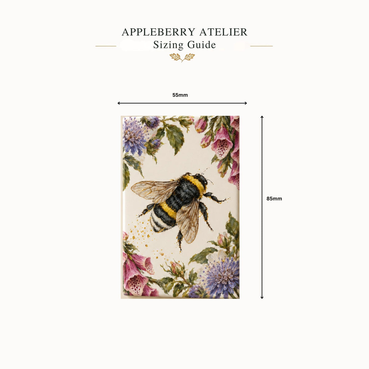 Sizing guide diagram for an Appleberry Atelier magnet, showing a rectangular floral print with a bumblebee illustration and dimension markers labelled 55 x 85 mm.