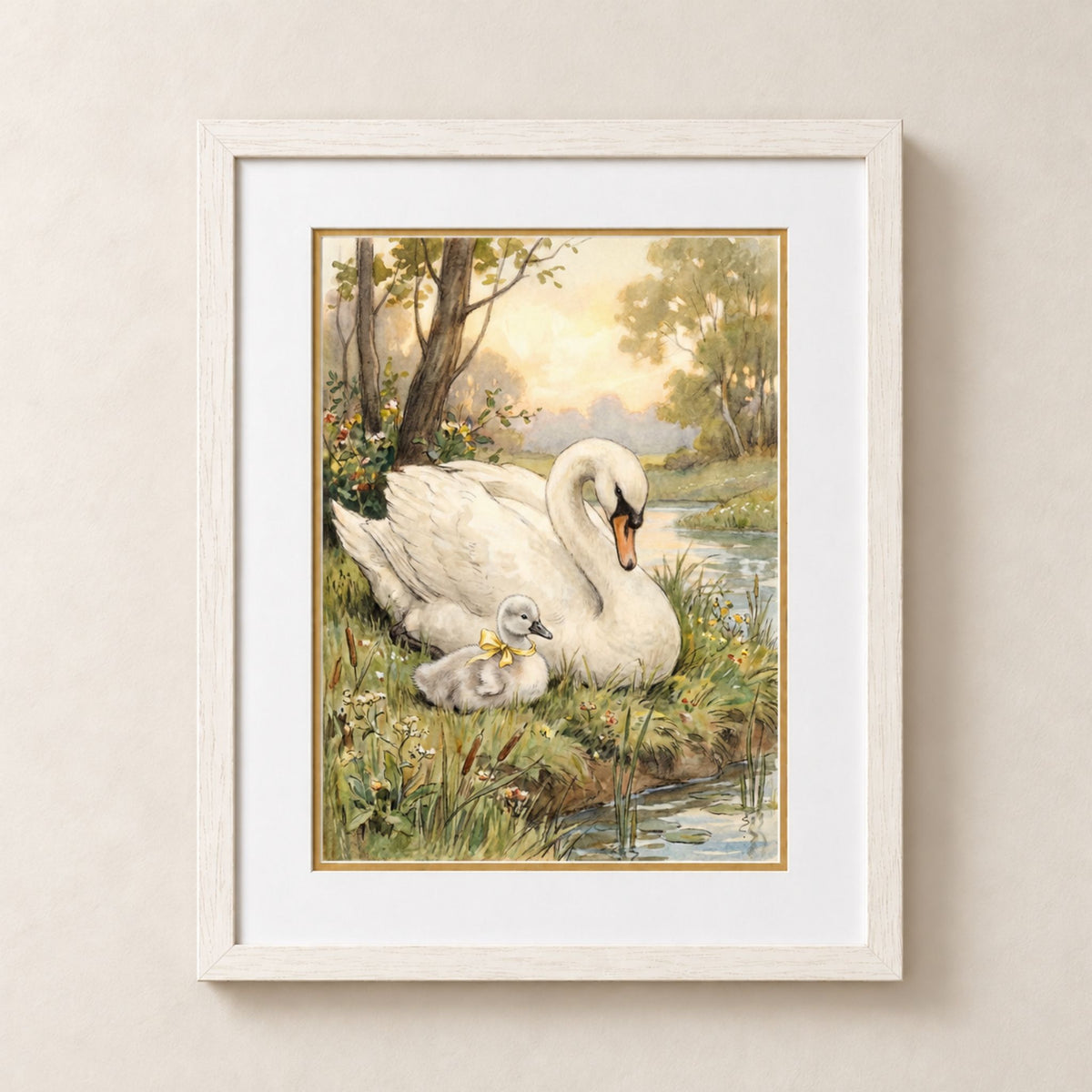 Framed art print featuring a white swan and its small gray cygelin baby by a calm lake, displayed on a light beige wall.