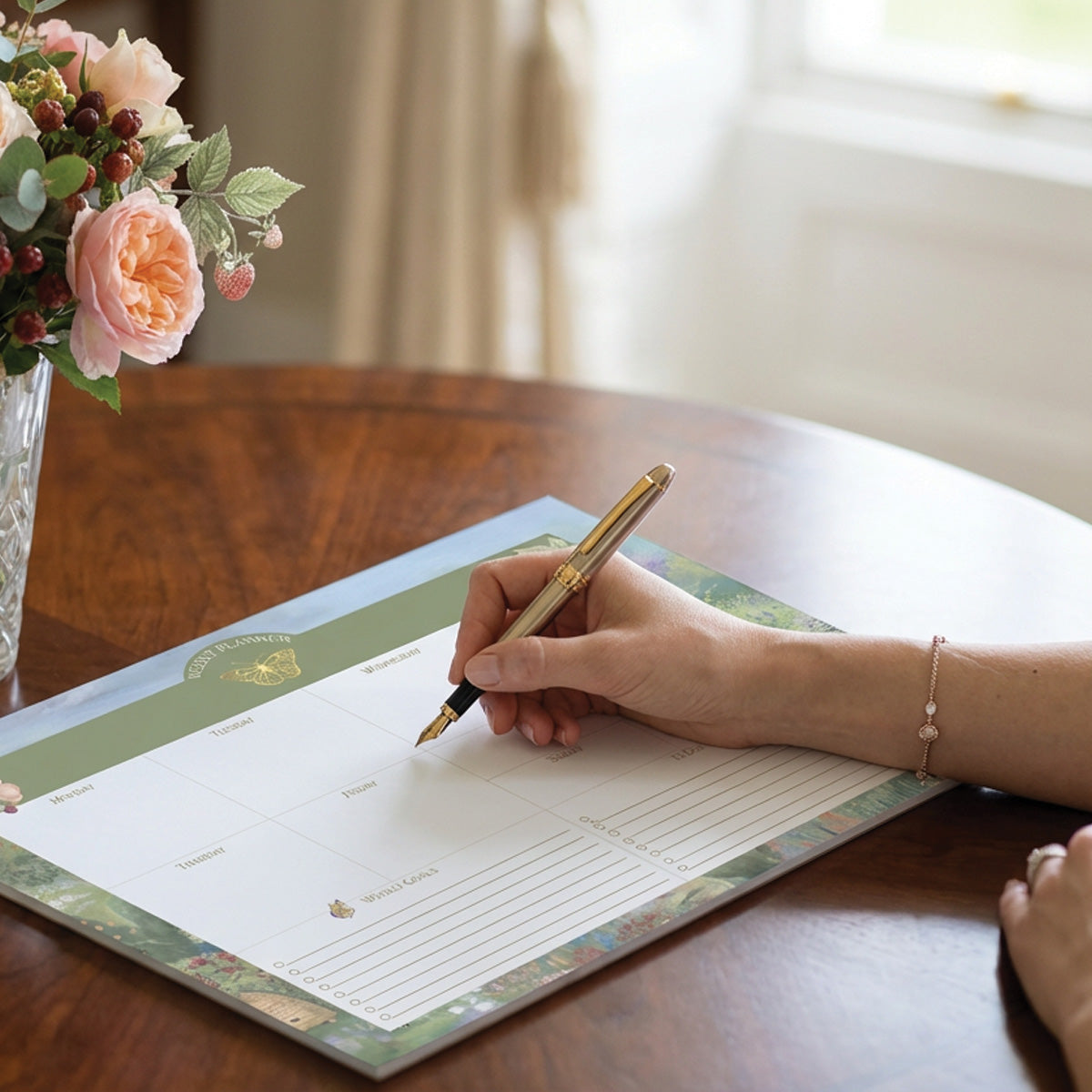 Butterfly Garden weekly planner pad featuring botanical floral artwork, butterfly illustrations, spacious planning layout, and luxury Irish stationery design.