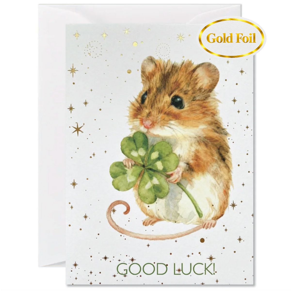 A good luck or St. Patrick's Day greeting card featuring a watercolor illustration of a brown and white hamster holding a green four-leaf clover, with gold star accents and the text 'GOOD LUCK!' at the bottom.