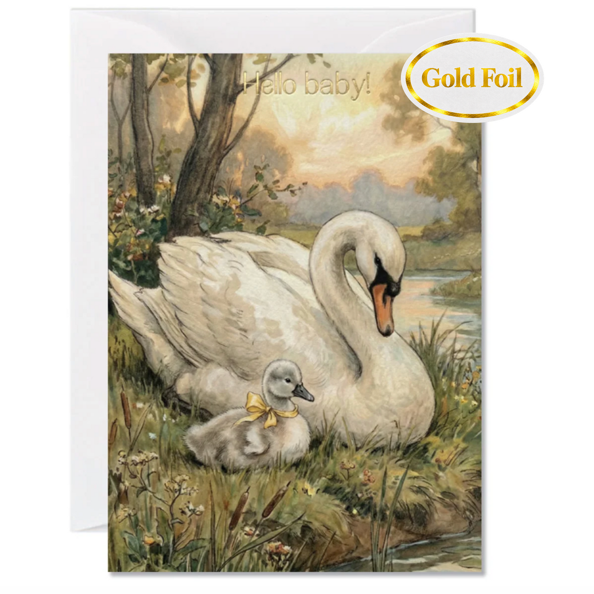 A greeting card featuring an illustration of a white swan and its cygnet sitting in grass by a pond, with the words 'Hello baby!' and a gold foil 'Gold Foil' badge shown on a white background.