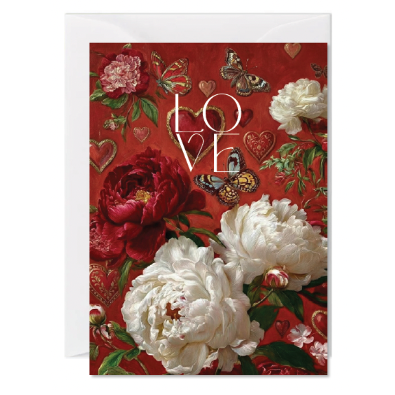 A Greeting card with a red floral design featuring large white and red peonies, butterflies, hearts, and the word 'LOVE' in white lettering, shown with a white envelope behind it on a white background.